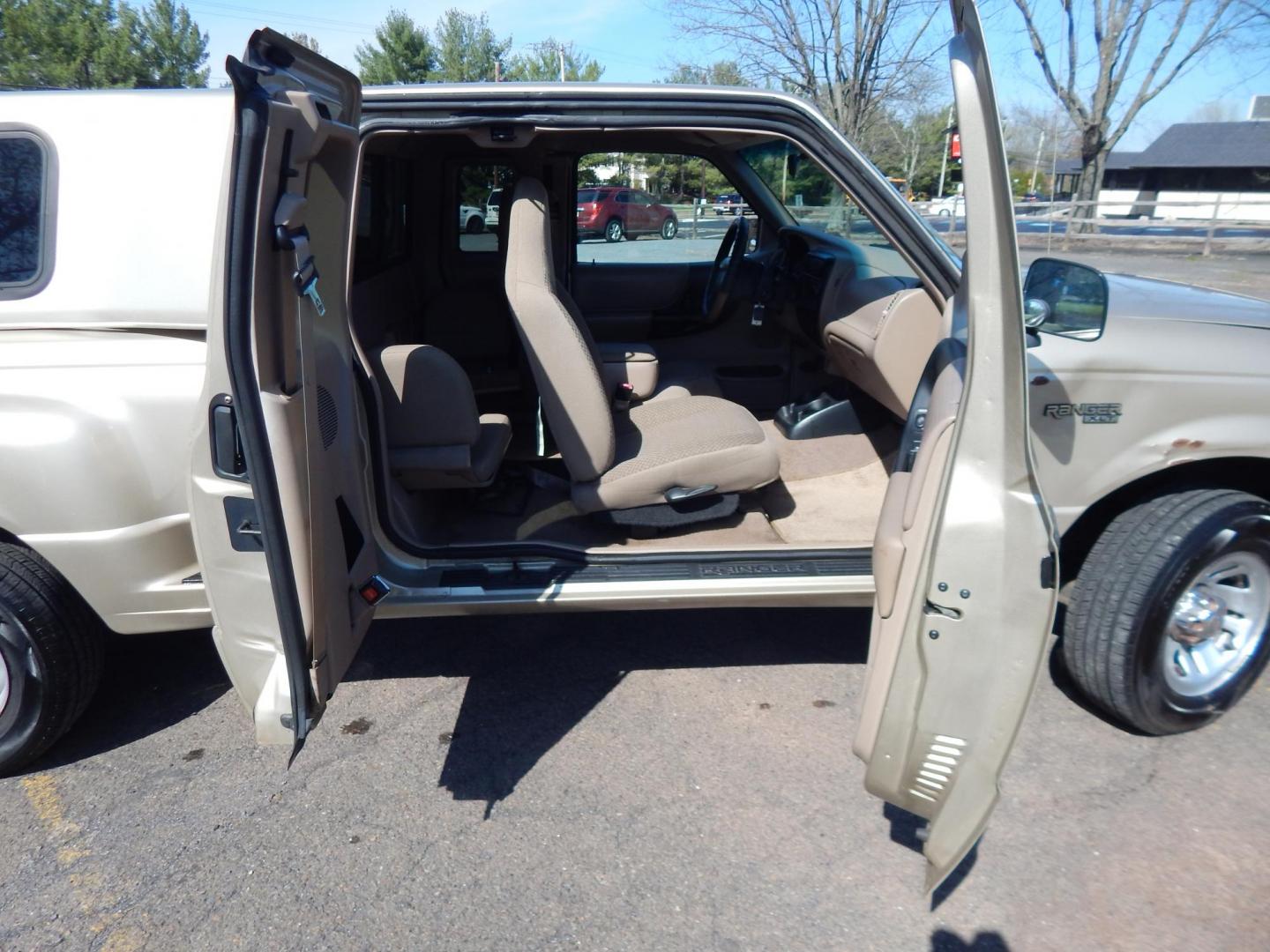 1999 Gold /Tan Ford Ranger XL SuperCab 2WD (1FTYR14V1XT) with an 3.0L V6 OHV 12V FFV engine, Automatic transmission, located at 6528 Lower York Road, New Hope, PA, 18938, (215) 862-9555, 40.358707, -74.977882 - Here we have a no accident, 3 owner Ford Ranger with a 3.0L V6 putting power to the rear wheels via an automatic transmission. Options include: tan cloth, manual seats, AM/FM/CD/TAPE radio, power windows and locks, tilt steering wheel, jump seats, 15 inch wheels, bed cap and side step. This truck ha - Photo#18