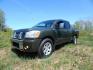 2005 Green /Gray Nissan Titan LE Crew Cab 4WD (1N6AA07B75N) with an 5.6L V8 DOHC 32V engine, 5-Speed Automatic Overdrive transmission, located at 6528 Lower York Road, New Hope, PA, 18938, (215) 862-9555, 40.358707, -74.977882 - Here we have a 2005 Nissan Titan with a 5.6L V8 putting power to the ground via a 4x4 automatic transmission. Options include: gray leather, power seats, heat and AC, heated front seats, aftermarket Sony radio, cruise control, tilt steering wheel, memory drivers seat, power windows/locks/mirrors, so - Photo#0