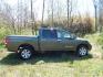 2005 Green /Gray Nissan Titan LE Crew Cab 4WD (1N6AA07B75N) with an 5.6L V8 DOHC 32V engine, 5-Speed Automatic Overdrive transmission, located at 6528 Lower York Road, New Hope, PA, 18938, (215) 862-9555, 40.358707, -74.977882 - Here we have a 2005 Nissan Titan with a 5.6L V8 putting power to the ground via a 4x4 automatic transmission. Options include: gray leather, power seats, heat and AC, heated front seats, aftermarket Sony radio, cruise control, tilt steering wheel, memory drivers seat, power windows/locks/mirrors, so - Photo#7