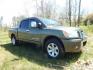2005 Green /Gray Nissan Titan LE Crew Cab 4WD (1N6AA07B75N) with an 5.6L V8 DOHC 32V engine, 5-Speed Automatic Overdrive transmission, located at 6528 Lower York Road, New Hope, PA, 18938, (215) 862-9555, 40.358707, -74.977882 - Here we have a 2005 Nissan Titan with a 5.6L V8 putting power to the ground via a 4x4 automatic transmission. Options include: gray leather, power seats, heat and AC, heated front seats, aftermarket Sony radio, cruise control, tilt steering wheel, memory drivers seat, power windows/locks/mirrors, so - Photo#8