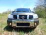 2005 Green /Gray Nissan Titan LE Crew Cab 4WD (1N6AA07B75N) with an 5.6L V8 DOHC 32V engine, 5-Speed Automatic Overdrive transmission, located at 6528 Lower York Road, New Hope, PA, 18938, (215) 862-9555, 40.358707, -74.977882 - Here we have a 2005 Nissan Titan with a 5.6L V8 putting power to the ground via a 4x4 automatic transmission. Options include: gray leather, power seats, heat and AC, heated front seats, aftermarket Sony radio, cruise control, tilt steering wheel, memory drivers seat, power windows/locks/mirrors, so - Photo#9
