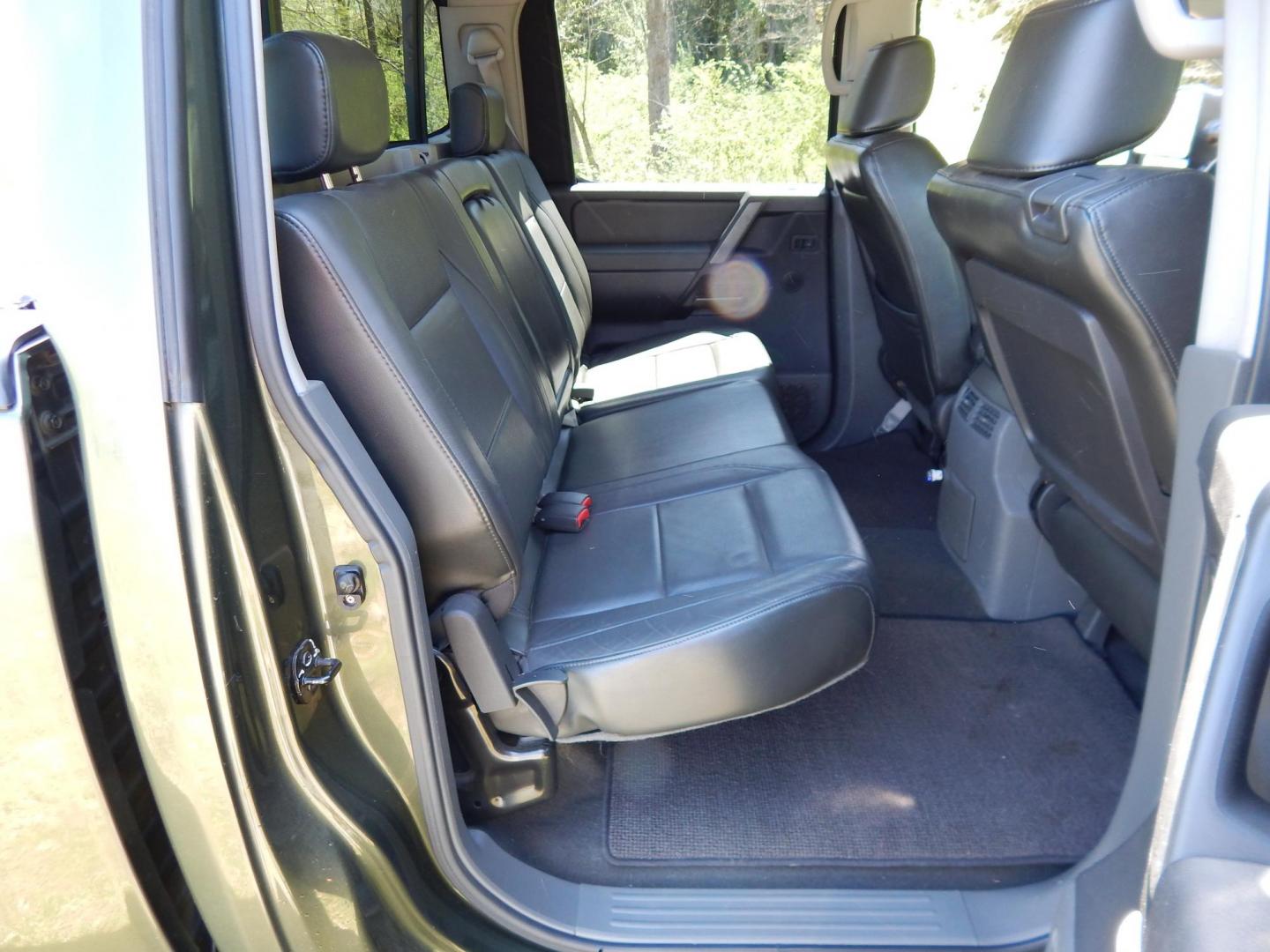 2005 Green /Gray Nissan Titan LE Crew Cab 4WD (1N6AA07B75N) with an 5.6L V8 DOHC 32V engine, 5-Speed Automatic Overdrive transmission, located at 6528 Lower York Road, New Hope, PA, 18938, (215) 862-9555, 40.358707, -74.977882 - Here we have a 2005 Nissan Titan with a 5.6L V8 putting power to the ground via a 4x4 automatic transmission. Options include: gray leather, power seats, heat and AC, heated front seats, aftermarket Sony radio, cruise control, tilt steering wheel, memory drivers seat, power windows/locks/mirrors, so - Photo#17