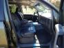 2005 Green /Gray Nissan Titan LE Crew Cab 4WD (1N6AA07B75N) with an 5.6L V8 DOHC 32V engine, 5-Speed Automatic Overdrive transmission, located at 6528 Lower York Road, New Hope, PA, 18938, (215) 862-9555, 40.358707, -74.977882 - Here we have a 2005 Nissan Titan with a 5.6L V8 putting power to the ground via a 4x4 automatic transmission. Options include: gray leather, power seats, heat and AC, heated front seats, aftermarket Sony radio, cruise control, tilt steering wheel, memory drivers seat, power windows/locks/mirrors, so - Photo#19