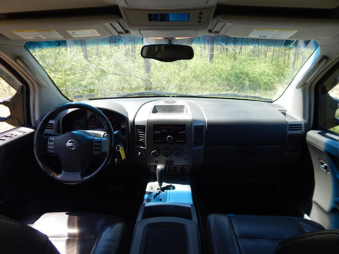 2005 Green /Gray Nissan Titan LE Crew Cab 4WD (1N6AA07B75N) with an 5.6L V8 DOHC 32V engine, 5-Speed Automatic Overdrive transmission, located at 6528 Lower York Road, New Hope, PA, 18938, (215) 862-9555, 40.358707, -74.977882 - Here we have a 2005 Nissan Titan with a 5.6L V8 putting power to the ground via a 4x4 automatic transmission. Options include: gray leather, power seats, heat and AC, heated front seats, aftermarket Sony radio, cruise control, tilt steering wheel, memory drivers seat, power windows/locks/mirrors, so - Photo#20