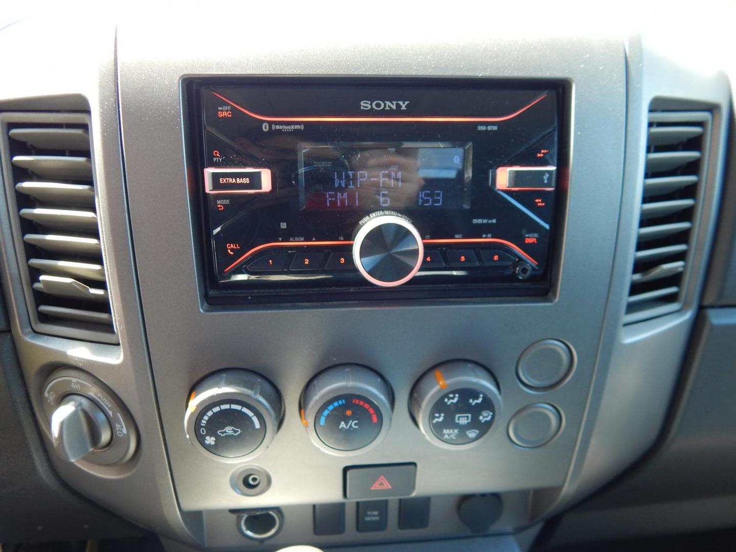 2005 Green /Gray Nissan Titan LE Crew Cab 4WD (1N6AA07B75N) with an 5.6L V8 DOHC 32V engine, 5-Speed Automatic Overdrive transmission, located at 6528 Lower York Road, New Hope, PA, 18938, (215) 862-9555, 40.358707, -74.977882 - Here we have a 2005 Nissan Titan with a 5.6L V8 putting power to the ground via a 4x4 automatic transmission. Options include: gray leather, power seats, heat and AC, heated front seats, aftermarket Sony radio, cruise control, tilt steering wheel, memory drivers seat, power windows/locks/mirrors, so - Photo#22