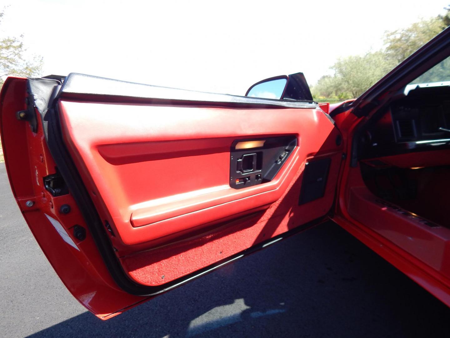 1988 Red /Red Chevrolet Corvette (1G1YY3181J5) with an 5.7L V8 engine, Manual transmission, located at 6528 Lower York Road, New Hope, PA, 18938, (215) 862-9555, 40.358707, -74.977882 - Here we have a beautifully kept, 23k original miles, Chevy Corvette Convertible with a 5.7L V8 putting power to the rear wheels via a smooth shifting 4 speed with overdrive transmission. Red paint with red leather interior and a white convertible top. Some options included are listed here. Please lo - Photo#12