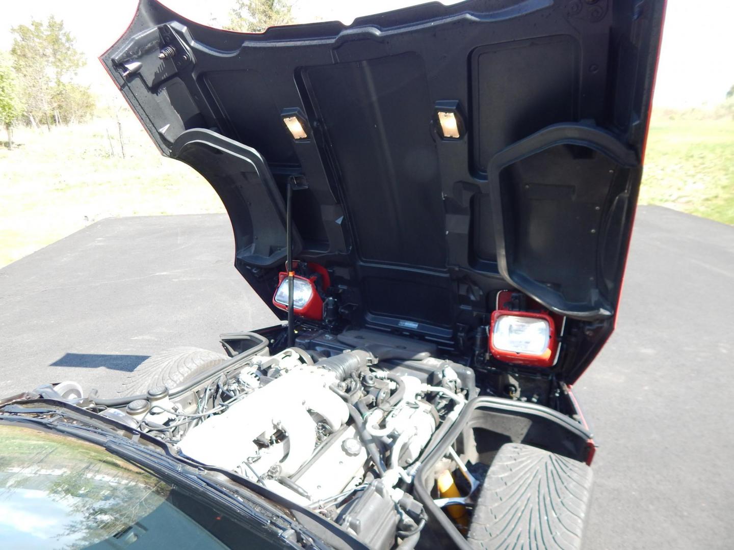 1988 Red /Red Chevrolet Corvette (1G1YY3181J5) with an 5.7L V8 engine, Manual transmission, located at 6528 Lower York Road, New Hope, PA, 18938, (215) 862-9555, 40.358707, -74.977882 - Here we have a beautifully kept, 23k original miles, Chevy Corvette Convertible with a 5.7L V8 putting power to the rear wheels via a smooth shifting 4 speed with overdrive transmission. Red paint with red leather interior and a white convertible top. Some options included are listed here. Please lo - Photo#26