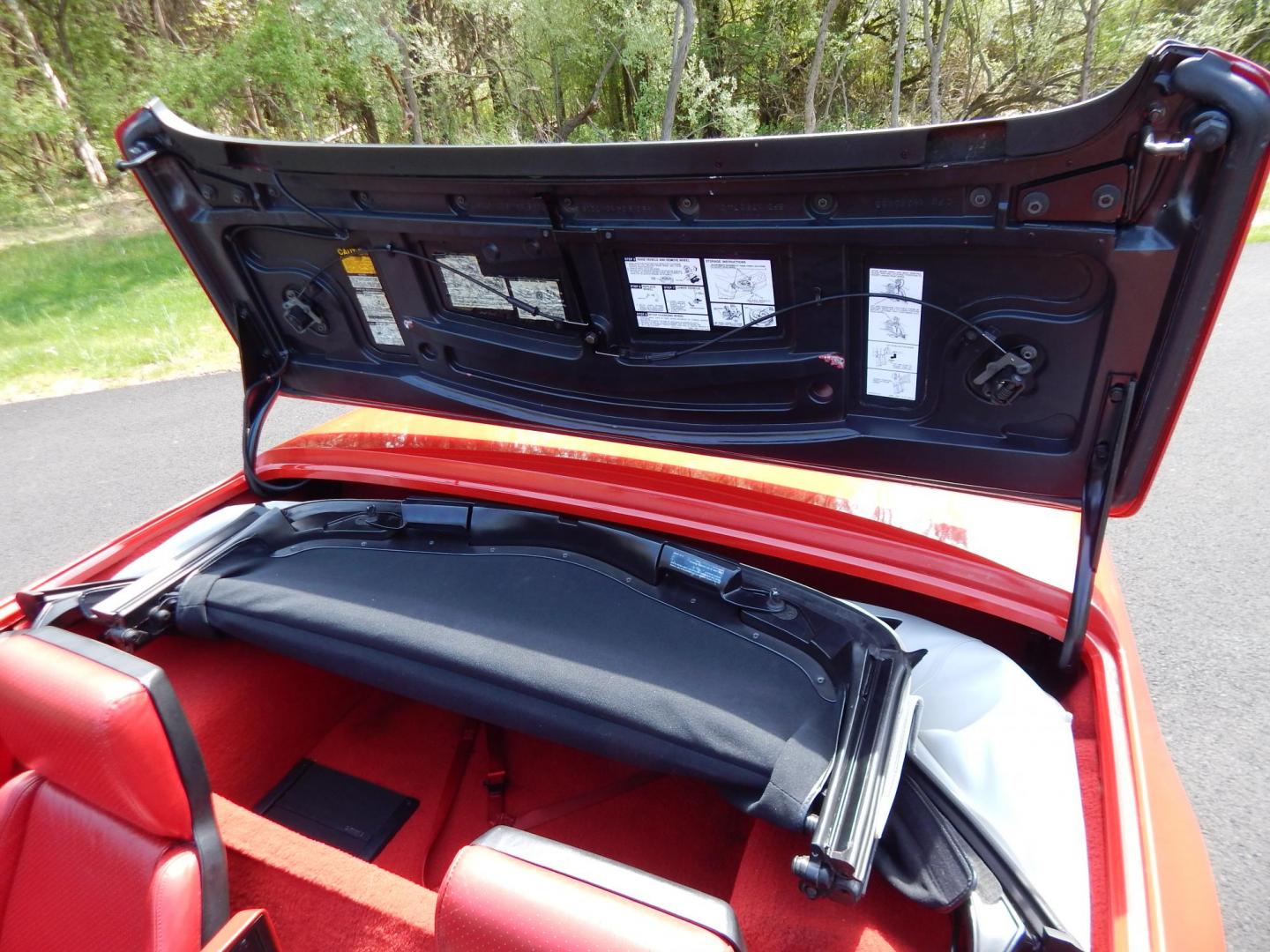 1988 Red /Red Chevrolet Corvette (1G1YY3181J5) with an 5.7L V8 engine, Manual transmission, located at 6528 Lower York Road, New Hope, PA, 18938, (215) 862-9555, 40.358707, -74.977882 - Here we have a beautifully kept, 23k original miles, Chevy Corvette Convertible with a 5.7L V8 putting power to the rear wheels via a smooth shifting 4 speed with overdrive transmission. Red paint with red leather interior and a white convertible top. Some options included are listed here. Please lo - Photo#53