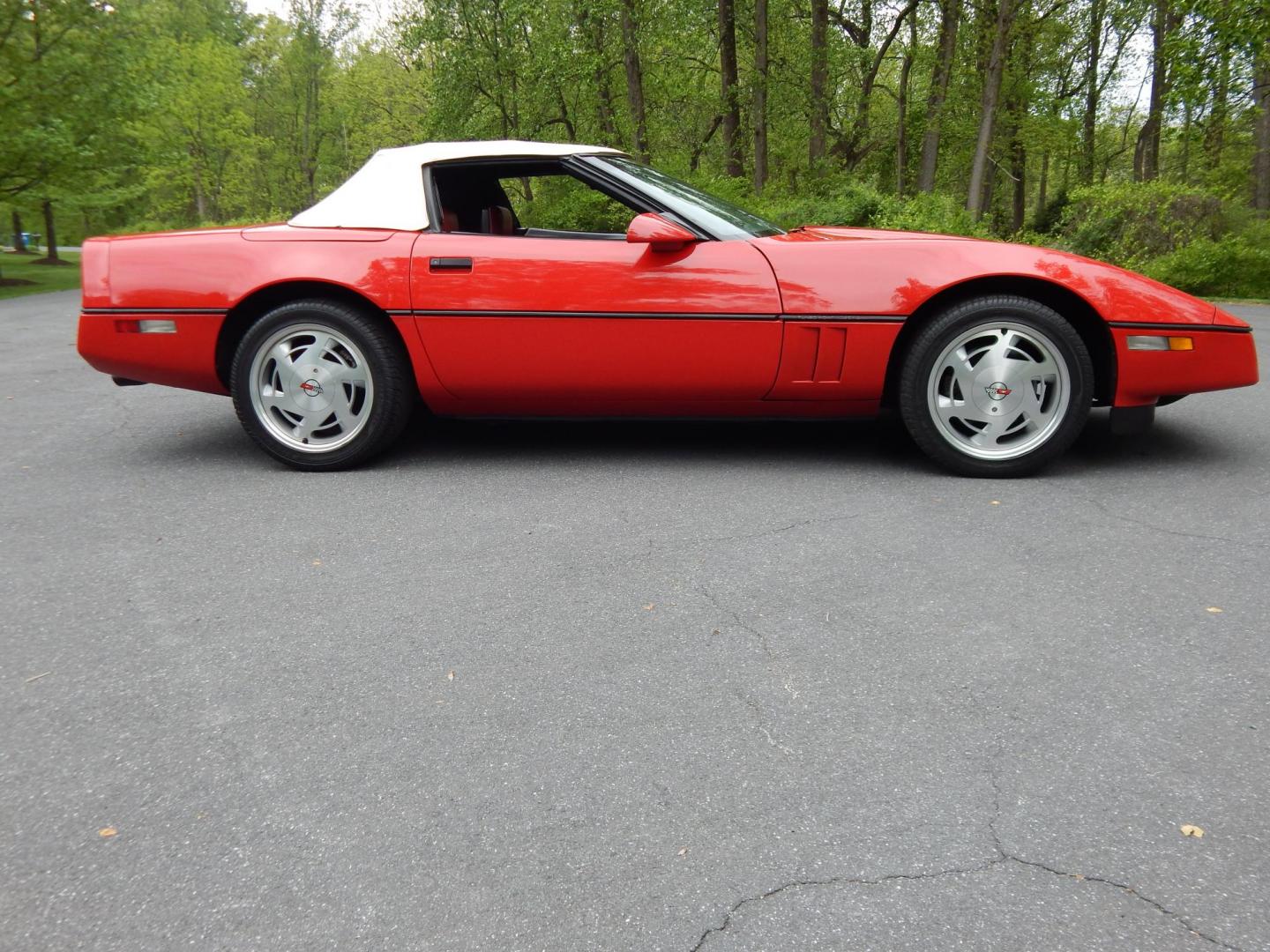 1988 Red /Red Chevrolet Corvette (1G1YY3181J5) with an 5.7L V8 engine, Manual transmission, located at 6528 Lower York Road, New Hope, PA, 18938, (215) 862-9555, 40.358707, -74.977882 - Here we have a beautifully kept, 23k original miles, Chevy Corvette Convertible with a 5.7L V8 putting power to the rear wheels via a smooth shifting 4 speed with overdrive transmission. Red paint with red leather interior and a white convertible top. Some options included are listed here. Please lo- Photo#63