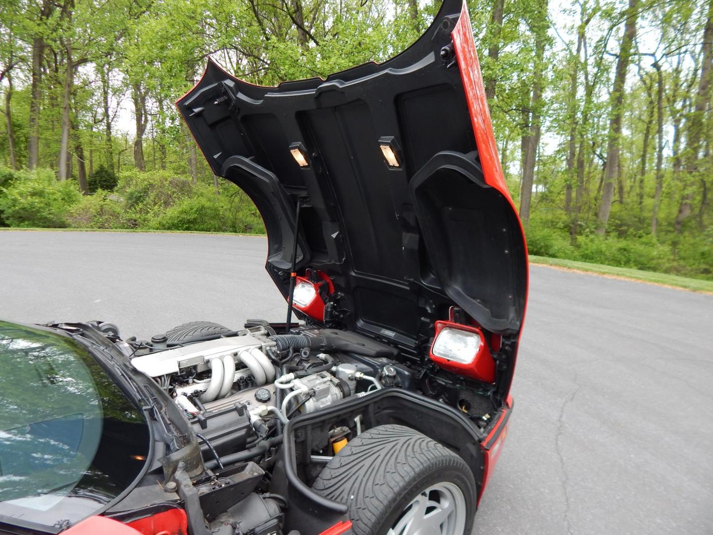 1988 Red /Red Chevrolet Corvette (1G1YY3181J5) with an 5.7L V8 engine, Manual transmission, located at 6528 Lower York Road, New Hope, PA, 18938, (215) 862-9555, 40.358707, -74.977882 - Here we have a beautifully kept, 23k original miles, Chevy Corvette Convertible with a 5.7L V8 putting power to the rear wheels via a smooth shifting 4 speed with overdrive transmission. Red paint with red leather interior and a white convertible top. Some options included are listed here. Please lo- Photo#73