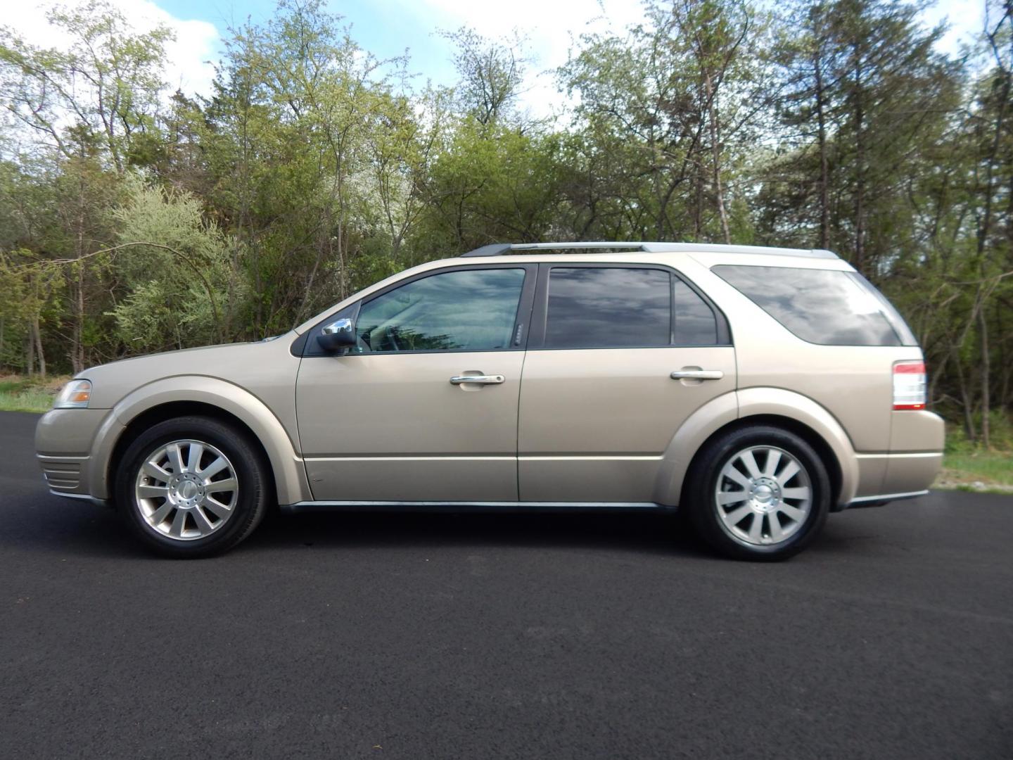 2008 Gold /Tan Ford Taurus X Limited AWD (1FMDK06W48G) with an 3.5L V6 DOHC 24V engine, 6-Speed Automatic Overdrive transmission, located at 6528 Lower York Road, New Hope, PA, 18938, (215) 862-9555, 40.358707, -74.977882 - Here we have a Ford Taurus X Limited with a 3.5L V6 putting power to all four wheels via an automatic transmission. Options include: tan leather with wood trim, power front seats, sunroof, heated front seats, dual plus rear climate, AM/FM/CD/AUX radio, cruise control, tilt steering wheel, automatic - Photo#1