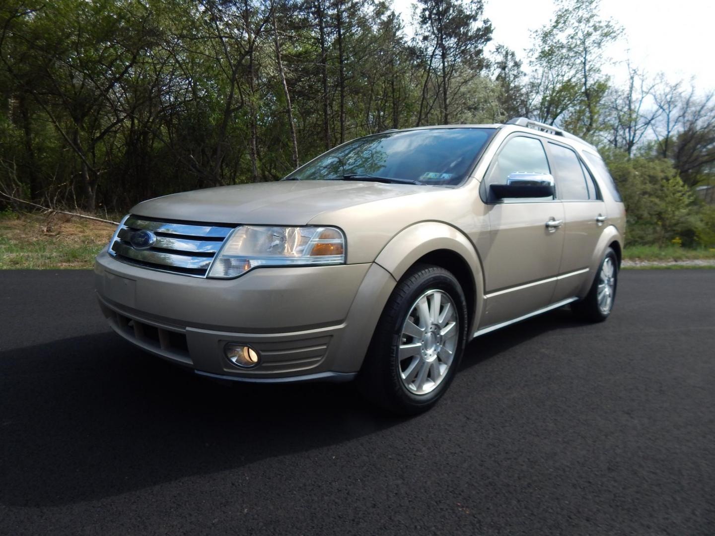2008 Gold /Tan Ford Taurus X Limited AWD (1FMDK06W48G) with an 3.5L V6 DOHC 24V engine, 6-Speed Automatic Overdrive transmission, located at 6528 Lower York Road, New Hope, PA, 18938, (215) 862-9555, 40.358707, -74.977882 - Here we have a Ford Taurus X Limited with a 3.5L V6 putting power to all four wheels via an automatic transmission. Options include: tan leather with wood trim, power front seats, sunroof, heated front seats, dual plus rear climate, AM/FM/CD/AUX radio, cruise control, tilt steering wheel, automatic - Photo#0