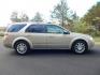 2008 Gold /Tan Ford Taurus X Limited AWD (1FMDK06W48G) with an 3.5L V6 DOHC 24V engine, 6-Speed Automatic Overdrive transmission, located at 6528 Lower York Road, New Hope, PA, 18938, (215) 862-9555, 40.358707, -74.977882 - Here we have a Ford Taurus X Limited with a 3.5L V6 putting power to all four wheels via an automatic transmission. Options include: tan leather with wood trim, power front seats, sunroof, heated front seats, dual plus rear climate, AM/FM/CD/AUX radio, cruise control, tilt steering wheel, automatic - Photo#6