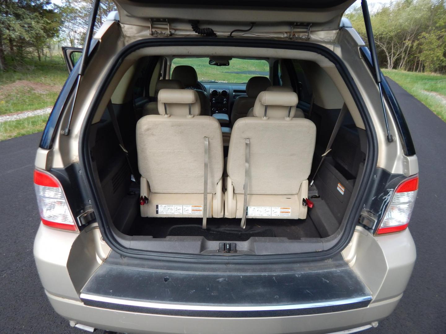 2008 Gold /Tan Ford Taurus X Limited AWD (1FMDK06W48G) with an 3.5L V6 DOHC 24V engine, 6-Speed Automatic Overdrive transmission, located at 6528 Lower York Road, New Hope, PA, 18938, (215) 862-9555, 40.358707, -74.977882 - Here we have a Ford Taurus X Limited with a 3.5L V6 putting power to all four wheels via an automatic transmission. Options include: tan leather with wood trim, power front seats, sunroof, heated front seats, dual plus rear climate, AM/FM/CD/AUX radio, cruise control, tilt steering wheel, automatic - Photo#15