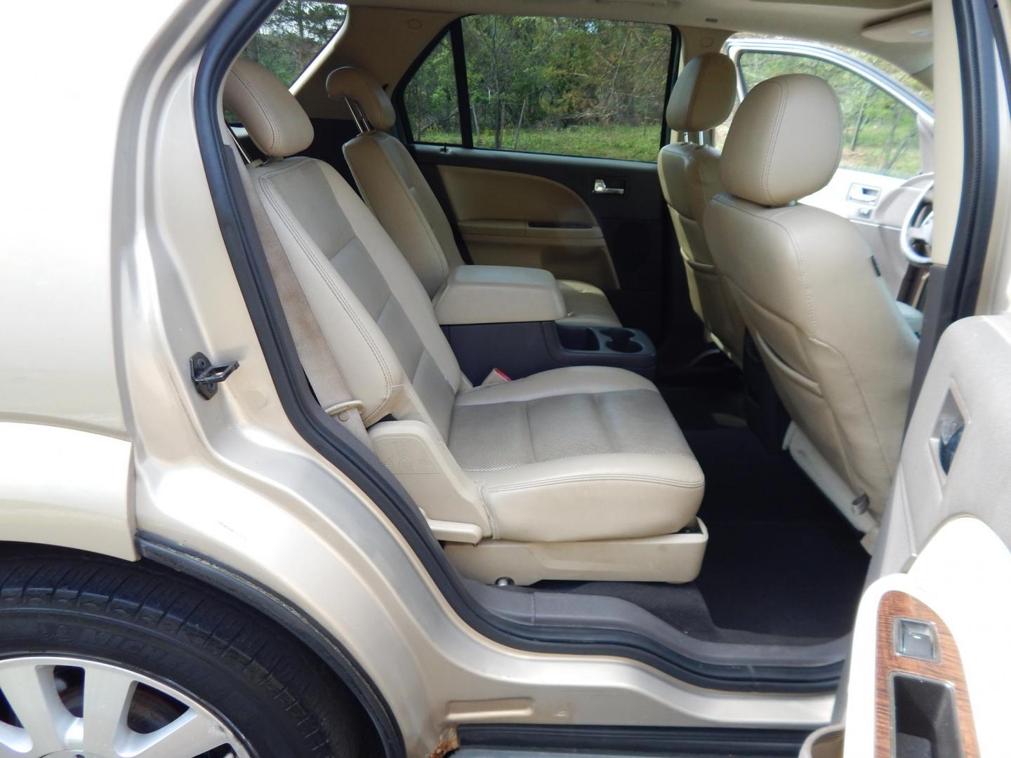 2008 Gold /Tan Ford Taurus X Limited AWD (1FMDK06W48G) with an 3.5L V6 DOHC 24V engine, 6-Speed Automatic Overdrive transmission, located at 6528 Lower York Road, New Hope, PA, 18938, (215) 862-9555, 40.358707, -74.977882 - Here we have a Ford Taurus X Limited with a 3.5L V6 putting power to all four wheels via an automatic transmission. Options include: tan leather with wood trim, power front seats, sunroof, heated front seats, dual plus rear climate, AM/FM/CD/AUX radio, cruise control, tilt steering wheel, automatic - Photo#17