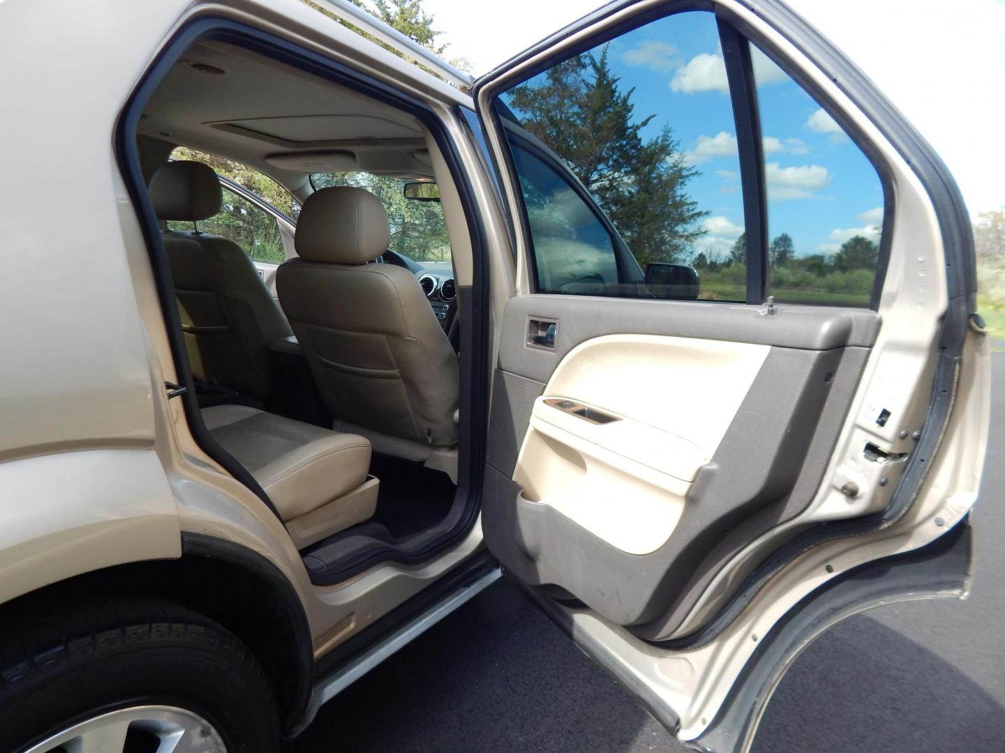 2008 Gold /Tan Ford Taurus X Limited AWD (1FMDK06W48G) with an 3.5L V6 DOHC 24V engine, 6-Speed Automatic Overdrive transmission, located at 6528 Lower York Road, New Hope, PA, 18938, (215) 862-9555, 40.358707, -74.977882 - Here we have a Ford Taurus X Limited with a 3.5L V6 putting power to all four wheels via an automatic transmission. Options include: tan leather with wood trim, power front seats, sunroof, heated front seats, dual plus rear climate, AM/FM/CD/AUX radio, cruise control, tilt steering wheel, automatic - Photo#16