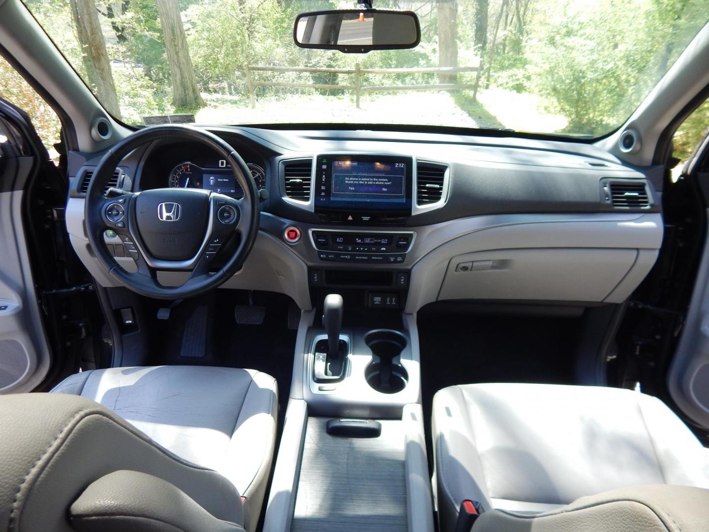 2016 Black /Gray Honda Pilot EXLN 4WD (5FNYF6H72GB) with an 3.5L V6 SOHC 24V engine, 6-Speed Automatic transmission, located at 6528 Lower York Road, New Hope, PA, 18938, (215) 862-9555, 40.358707, -74.977882 - Here we have a 2016 Honda Pilot with a rebuilt title! This Honda has a 3.5L V6 putting power to all four wheels via an automatic transmission. Options include: gray leather, power seats, heated front seats, dual plus rear climate control, sunroof, push button start, AM/FM/XM/BLUETOOTH/AUX radio, bac - Photo#20