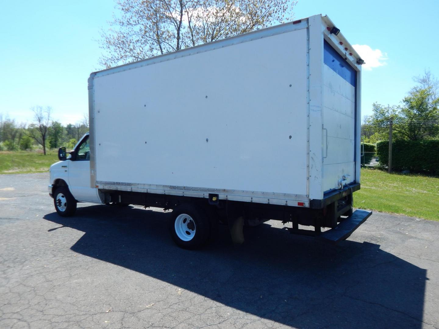 2014 White /Gray Ford E-Series Van E-350 Super Duty (1FDWE3FL3ED) with an 5.4L V8 SOHC 16V FFV engine, 4-Speed Automatic transmission, located at 6528 Lower York Road, New Hope, PA, 18938, (215) 862-9555, 40.358707, -74.977882 - Here we have a Ford E-350 box truck with a 5.4L V8 putting power to the dually rear wheels via an automatic transmission. Options include: gray leather, heat, AC, Kenwood aftermarket radio, tilt steering wheel, cruise control, power windows, custom wood shelving, 16 inch wheels and a sliding loading - Photo#2