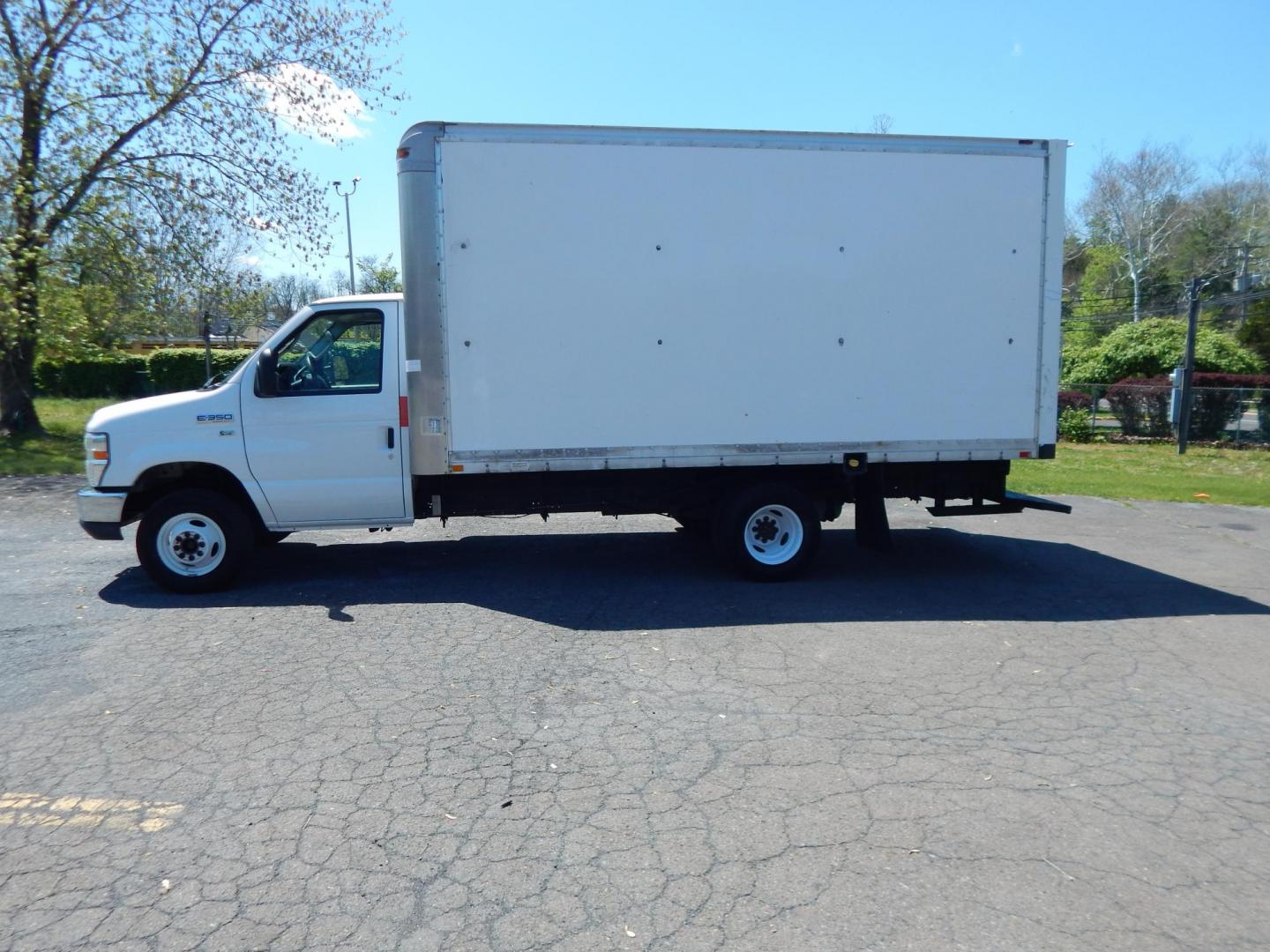 2014 White /Gray Ford E-Series Van E-350 Super Duty (1FDWE3FL3ED) with an 5.4L V8 SOHC 16V FFV engine, 4-Speed Automatic transmission, located at 6528 Lower York Road, New Hope, PA, 18938, (215) 862-9555, 40.358707, -74.977882 - Here we have a Ford E-350 box truck with a 5.4L V8 putting power to the dually rear wheels via an automatic transmission. Options include: gray leather, heat, AC, Kenwood aftermarket radio, tilt steering wheel, cruise control, power windows, custom wood shelving, 16 inch wheels and a sliding loading - Photo#1