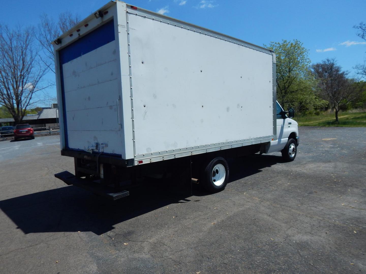 2014 White /Gray Ford E-Series Van E-350 Super Duty (1FDWE3FL3ED) with an 5.4L V8 SOHC 16V FFV engine, 4-Speed Automatic transmission, located at 6528 Lower York Road, New Hope, PA, 18938, (215) 862-9555, 40.358707, -74.977882 - Here we have a Ford E-350 box truck with a 5.4L V8 putting power to the dually rear wheels via an automatic transmission. Options include: gray leather, heat, AC, Kenwood aftermarket radio, tilt steering wheel, cruise control, power windows, custom wood shelving, 16 inch wheels and a sliding loading - Photo#3
