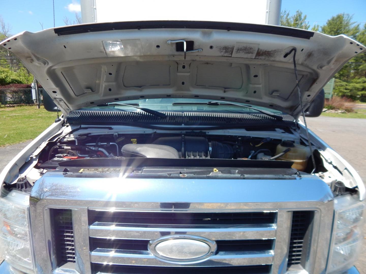2014 White /Gray Ford E-Series Van E-350 Super Duty (1FDWE3FL3ED) with an 5.4L V8 SOHC 16V FFV engine, 4-Speed Automatic transmission, located at 6528 Lower York Road, New Hope, PA, 18938, (215) 862-9555, 40.358707, -74.977882 - Here we have a Ford E-350 box truck with a 5.4L V8 putting power to the dually rear wheels via an automatic transmission. Options include: gray leather, heat, AC, Kenwood aftermarket radio, tilt steering wheel, cruise control, power windows, custom wood shelving, 16 inch wheels and a sliding loading - Photo#15