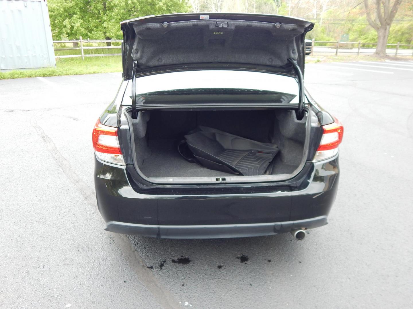 2017 black /black Subaru Impreza 2.0i Sport 4-Door (4S3GKAL64H1) with an 2.0L H4 DOHC 16V engine, Manual transmission, located at 6528 Lower York Road, New Hope, PA, 18938, (215) 862-9555, 40.358707, -74.977882 - Here we have a Subaru Impreza with a 2.0L 4 cylinder putting power to all four wheels via a 5 speed manual transmission. This car has a buy back/lemon branded title. Options include: black cloth, heated seats, AC, heat, AM/FM/Bluetooth radio, back up camera, push button start, tilt steering wheel, p - Photo#13