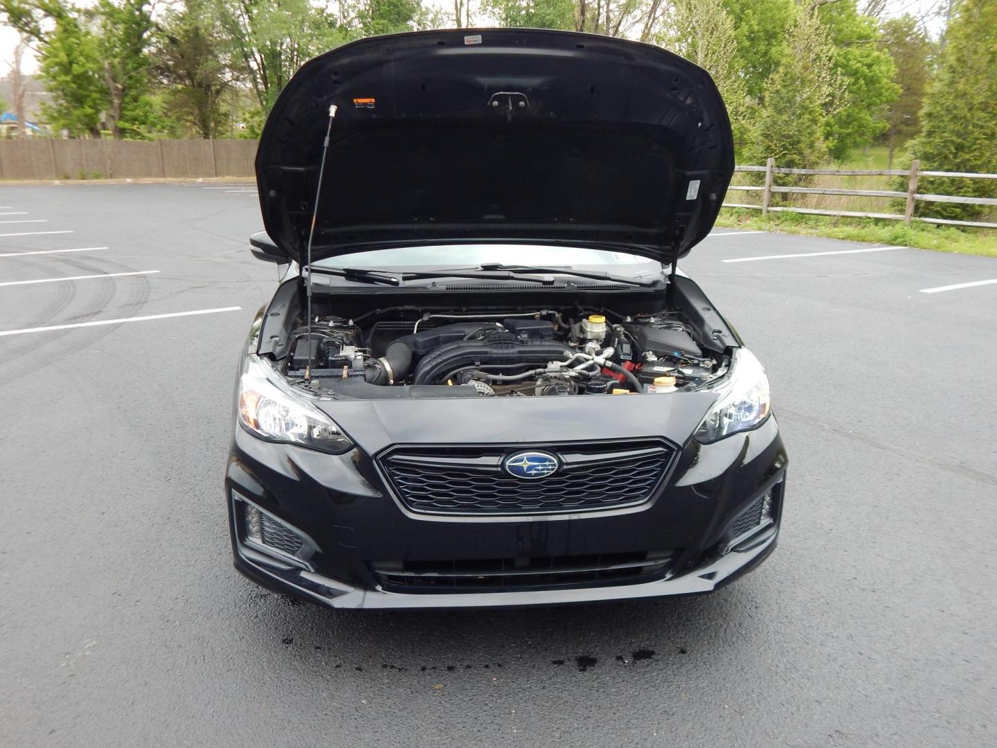 2017 black /black Subaru Impreza 2.0i Sport 4-Door (4S3GKAL64H1) with an 2.0L H4 DOHC 16V engine, Manual transmission, located at 6528 Lower York Road, New Hope, PA, 18938, (215) 862-9555, 40.358707, -74.977882 - Here we have a Subaru Impreza with a 2.0L 4 cylinder putting power to all four wheels via a 5 speed manual transmission. This car has a buy back/lemon branded title. Options include: black cloth, heated seats, AC, heat, AM/FM/Bluetooth radio, back up camera, push button start, tilt steering wheel, p - Photo#18