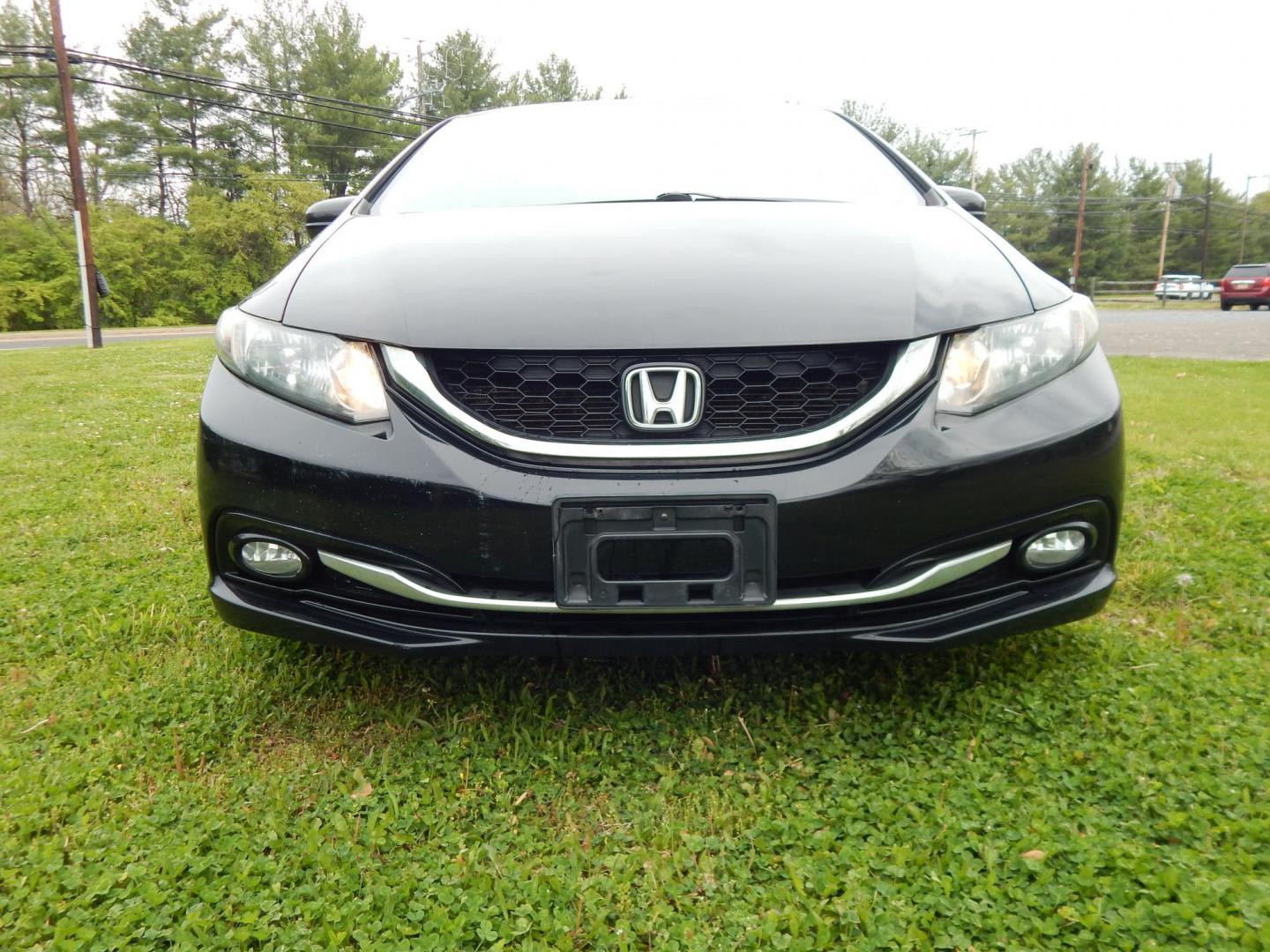 2015 black /gray Honda Civic EX-L Sedan CVT (19XFB2F95FE) with an 1.8L L4 SOHC 16V engine, Continuously Variable Transmission transmission, located at 6528 Lower York Road, New Hope, PA, 18938, (215) 862-9555, 40.358707, -74.977882 - Here we have a Honda Civic with a 1.8L inline 4 cylinder engine cutting power to the front wheels via an automatic transmission. Options include: gray leather, drivers power seat, heated front seats, heat, AC, AM/FM/BLUETOOTH radio, keyless start, sunroof, tilt steering wheel, cruise control, power - Photo#6