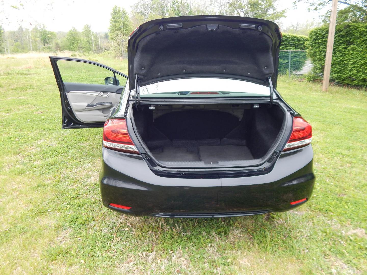 2015 black /gray Honda Civic EX-L Sedan CVT (19XFB2F95FE) with an 1.8L L4 SOHC 16V engine, Continuously Variable Transmission transmission, located at 6528 Lower York Road, New Hope, PA, 18938, (215) 862-9555, 40.358707, -74.977882 - Here we have a Honda Civic with a 1.8L inline 4 cylinder engine cutting power to the front wheels via an automatic transmission. Options include: gray leather, drivers power seat, heated front seats, heat, AC, AM/FM/BLUETOOTH radio, keyless start, sunroof, tilt steering wheel, cruise control, power - Photo#14