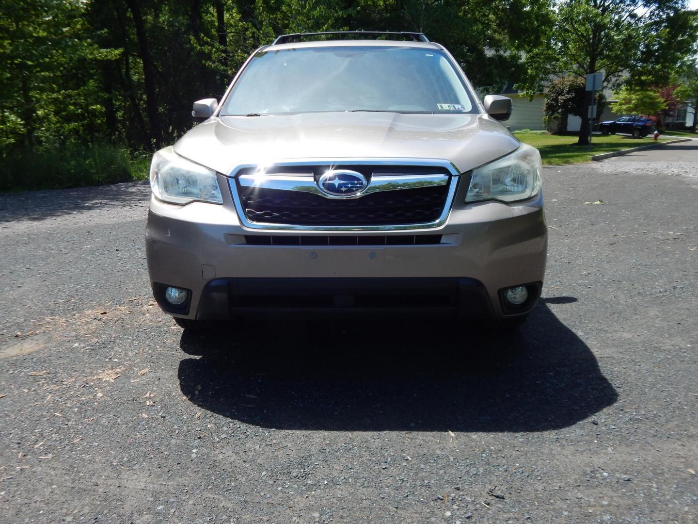 2015 Gold /Black Subaru Forester 2.5i Touring (JF2SJAWC8FH) with an 2.5L H4 SOHC 16V engine, 6-Speed Automatic transmission, located at 6528 Lower York Road, New Hope, PA, 18938, (215) 862-9555, 40.358707, -74.977882 - Here we have a Subaru Forester with a 2.5 L 4 cylinder engine putting power to all four wheels via an automatic transmission. Options include: black leather, power drivers seat, heated front seat, dual climate controls, AM/FM/XM/DISC/BLUETOOTH, tilt steering wheel, cruise control, Harman/Kardon spea - Photo#6