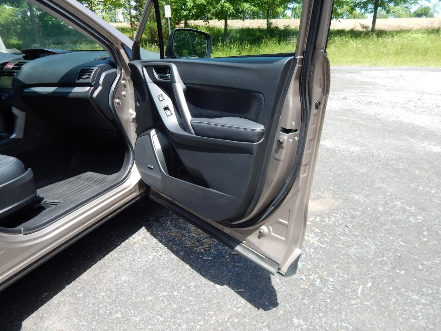 2015 Gold /Black Subaru Forester 2.5i Touring (JF2SJAWC8FH) with an 2.5L H4 SOHC 16V engine, 6-Speed Automatic transmission, located at 6528 Lower York Road, New Hope, PA, 18938, (215) 862-9555, 40.358707, -74.977882 - Here we have a Subaru Forester with a 2.5 L 4 cylinder engine putting power to all four wheels via an automatic transmission. Options include: black leather, power drivers seat, heated front seat, dual climate controls, AM/FM/XM/DISC/BLUETOOTH, tilt steering wheel, cruise control, Harman/Kardon spea - Photo#16