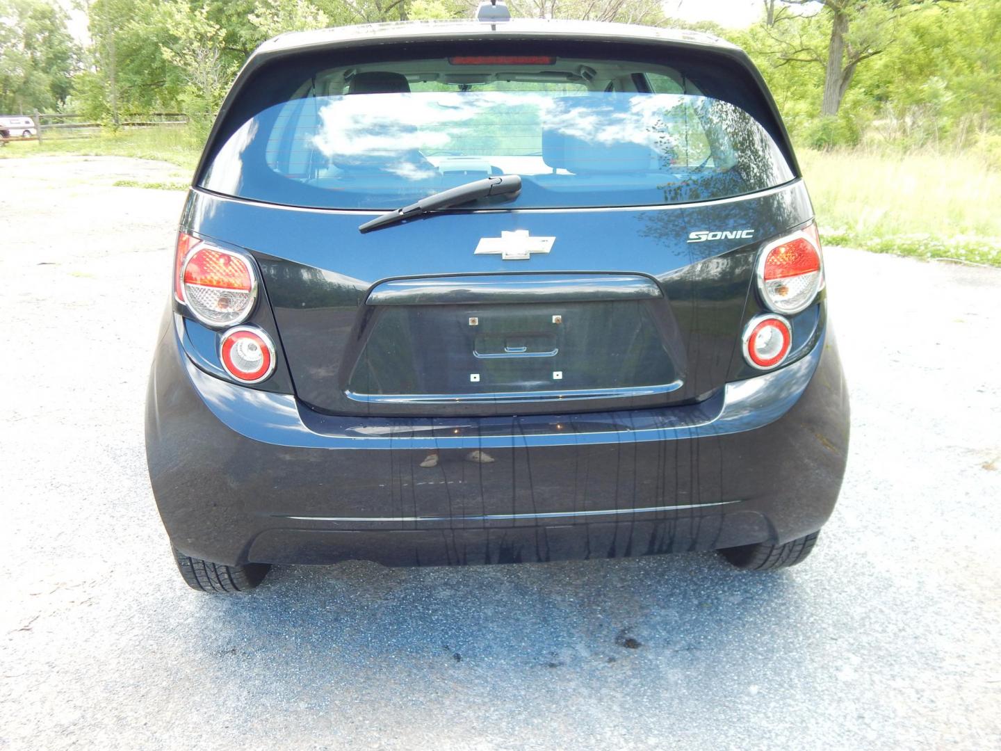 2015 black /Gray Chevrolet Sonic LS Auto 5-Door (1G1JA6SHXF4) with an 1.8L L4 DOHC 24V engine, 6A transmission, located at 6528 Lower York Road, New Hope, PA, 18938, (215) 862-9555, 40.358707, -74.977882 - 2015 Chevrolet Sonic LS, 1.8 Liter front wheel drive automatic. Options include: gray cloth, heat, AC, AM/FM/MEDIA radio, roll up windows, manual mirrors, automatic headlights, tilt steering wheel, power locks, 15 inch wheels with 4 Falken tires. Pa inspection good until 9/26. Carfax reports ONE OW- Photo#7