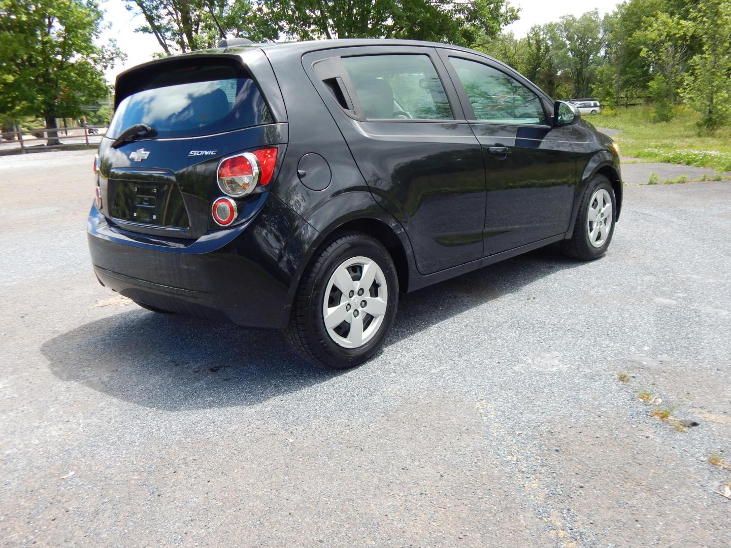 2015 black /Gray Chevrolet Sonic LS Auto 5-Door (1G1JA6SHXF4) with an 1.8L L4 DOHC 24V engine, 6A transmission, located at 6528 Lower York Road, New Hope, PA, 18938, (215) 862-9555, 40.358707, -74.977882 - 2015 Chevrolet Sonic LS, 1.8 Liter front wheel drive automatic. Options include: gray cloth, heat, AC, AM/FM/MEDIA radio, roll up windows, manual mirrors, automatic headlights, tilt steering wheel, power locks, 15 inch wheels with 4 Falken tires. Pa inspection good until 9/26. Carfax reports ONE OW- Photo#3