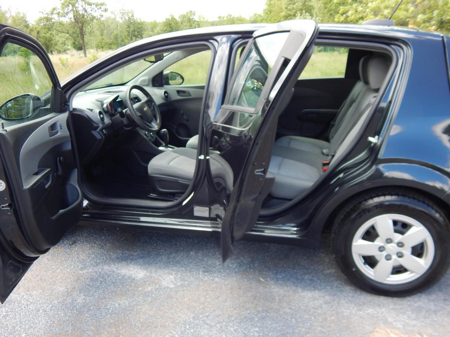 2015 black /Gray Chevrolet Sonic LS Auto 5-Door (1G1JA6SHXF4) with an 1.8L L4 DOHC 24V engine, 6A transmission, located at 6528 Lower York Road, New Hope, PA, 18938, (215) 862-9555, 40.358707, -74.977882 - 2015 Chevrolet Sonic LS, 1.8 Liter front wheel drive automatic. Options include: gray cloth, heat, AC, AM/FM/MEDIA radio, roll up windows, manual mirrors, automatic headlights, tilt steering wheel, power locks, 15 inch wheels with 4 Falken tires. Pa inspection good until 9/26. Carfax reports ONE OW- Photo#12