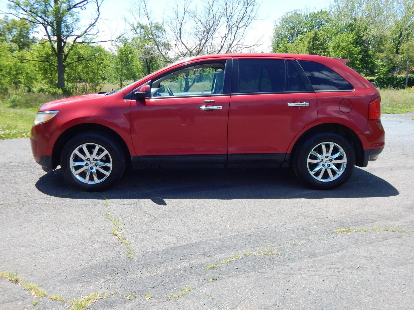 2011 Red /Tan Ford Edge SEL AWD (2FMDK4JC2BB) with an 3.5L V6 DOHC 24V engine, 6-Speed Automatic transmission, located at 6528 Lower York Road, New Hope, PA, 18938, (215) 862-9555, 40.358707, -74.977882 - Here we have a ONE OWNER, Ford Edge with a 3.5L V6 putting power to all four wheels via an automatic transmission. Options include: tan leather, power seats, heated front seats, dual climate controls, am/fm/cd/bluetooth/sir radio, navigation, cruise control, ambient lighting, power windows/locks/mir - Photo#1