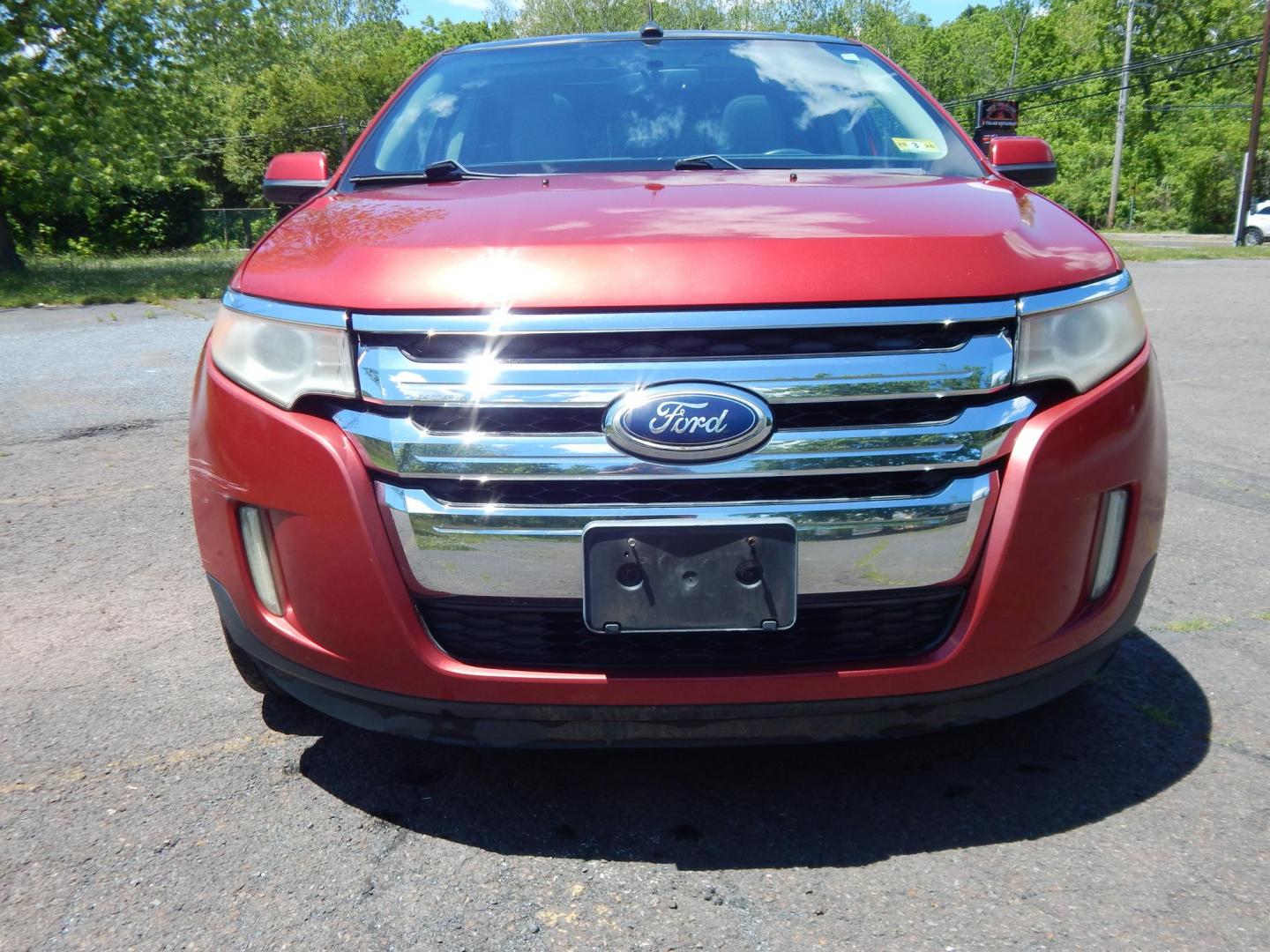 2011 Red /Tan Ford Edge SEL AWD (2FMDK4JC2BB) with an 3.5L V6 DOHC 24V engine, 6-Speed Automatic transmission, located at 6528 Lower York Road, New Hope, PA, 18938, (215) 862-9555, 40.358707, -74.977882 - Here we have a ONE OWNER, Ford Edge with a 3.5L V6 putting power to all four wheels via an automatic transmission. Options include: tan leather, power seats, heated front seats, dual climate controls, am/fm/cd/bluetooth/sir radio, navigation, cruise control, ambient lighting, power windows/locks/mir - Photo#6
