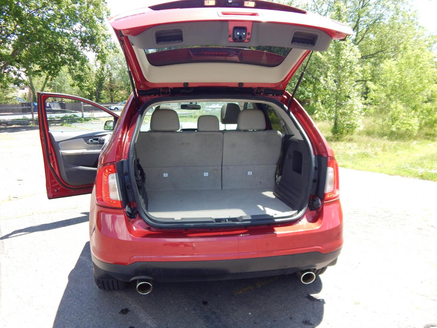 2011 Red /Tan Ford Edge SEL AWD (2FMDK4JC2BB) with an 3.5L V6 DOHC 24V engine, 6-Speed Automatic transmission, located at 6528 Lower York Road, New Hope, PA, 18938, (215) 862-9555, 40.358707, -74.977882 - Here we have a ONE OWNER, Ford Edge with a 3.5L V6 putting power to all four wheels via an automatic transmission. Options include: tan leather, power seats, heated front seats, dual climate controls, am/fm/cd/bluetooth/sir radio, navigation, cruise control, ambient lighting, power windows/locks/mir - Photo#8