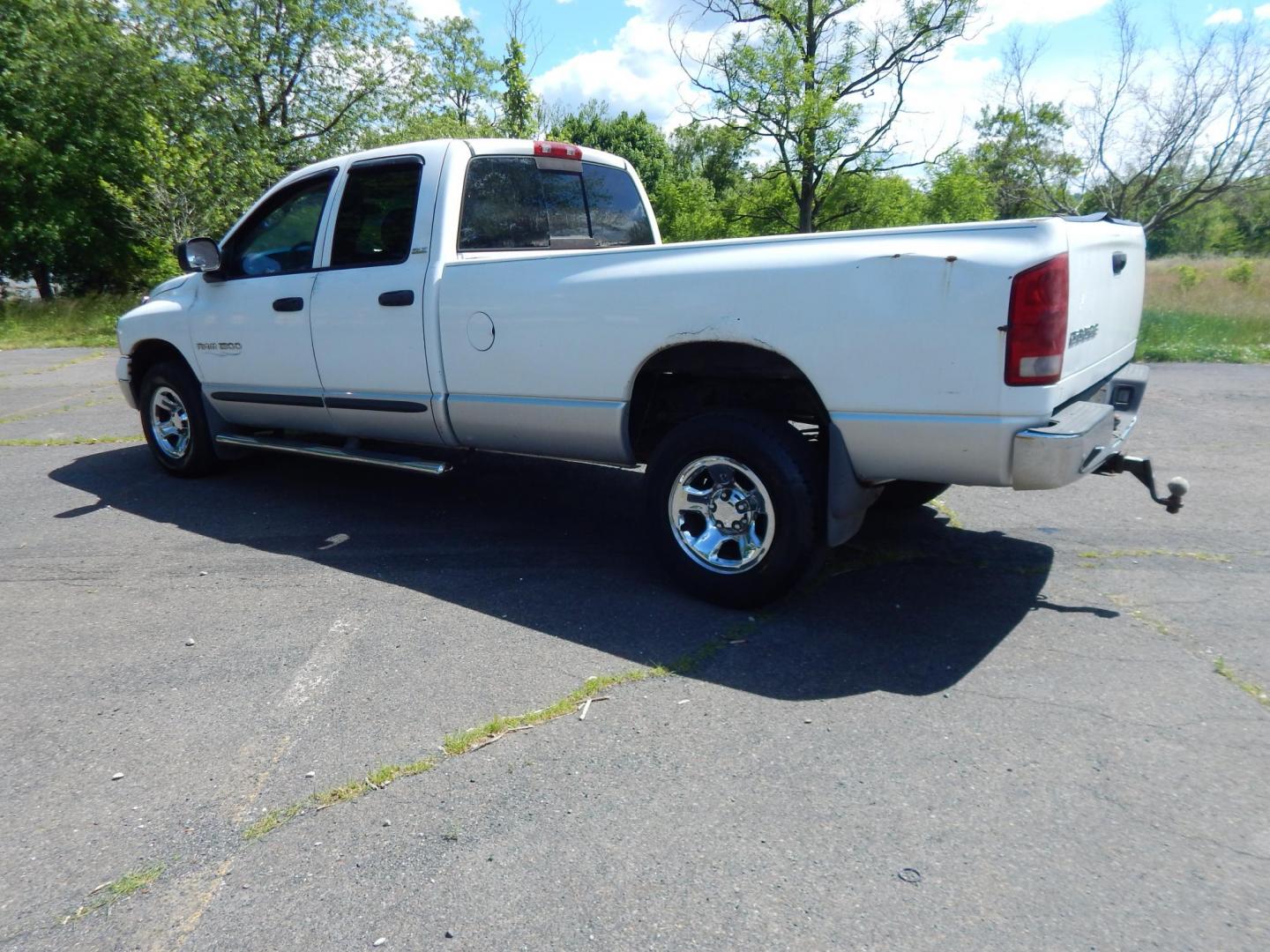 2002 White /Black Dodge Ram 1500 SLT Plus Quad Cab Long Bed 2WD (3D7HA18N52G) with an 4.7L V8 SOHC 16V engine, AUtomatic transmission, located at 6528 Lower York Road, New Hope, PA, 18938, (215) 862-9555, 40.358707, -74.977882 - Here we have a Ram 1500 with a 4.7L V8 putting power to the rear wheels via an automatic transmission. Options include: black cloth, heat, AM/FM/CD radio, cruise control, tilt steering wheel and a rear sliding window. This truck is being sold AS-IS and on consignment for a local client of ours. Kno- Photo#2