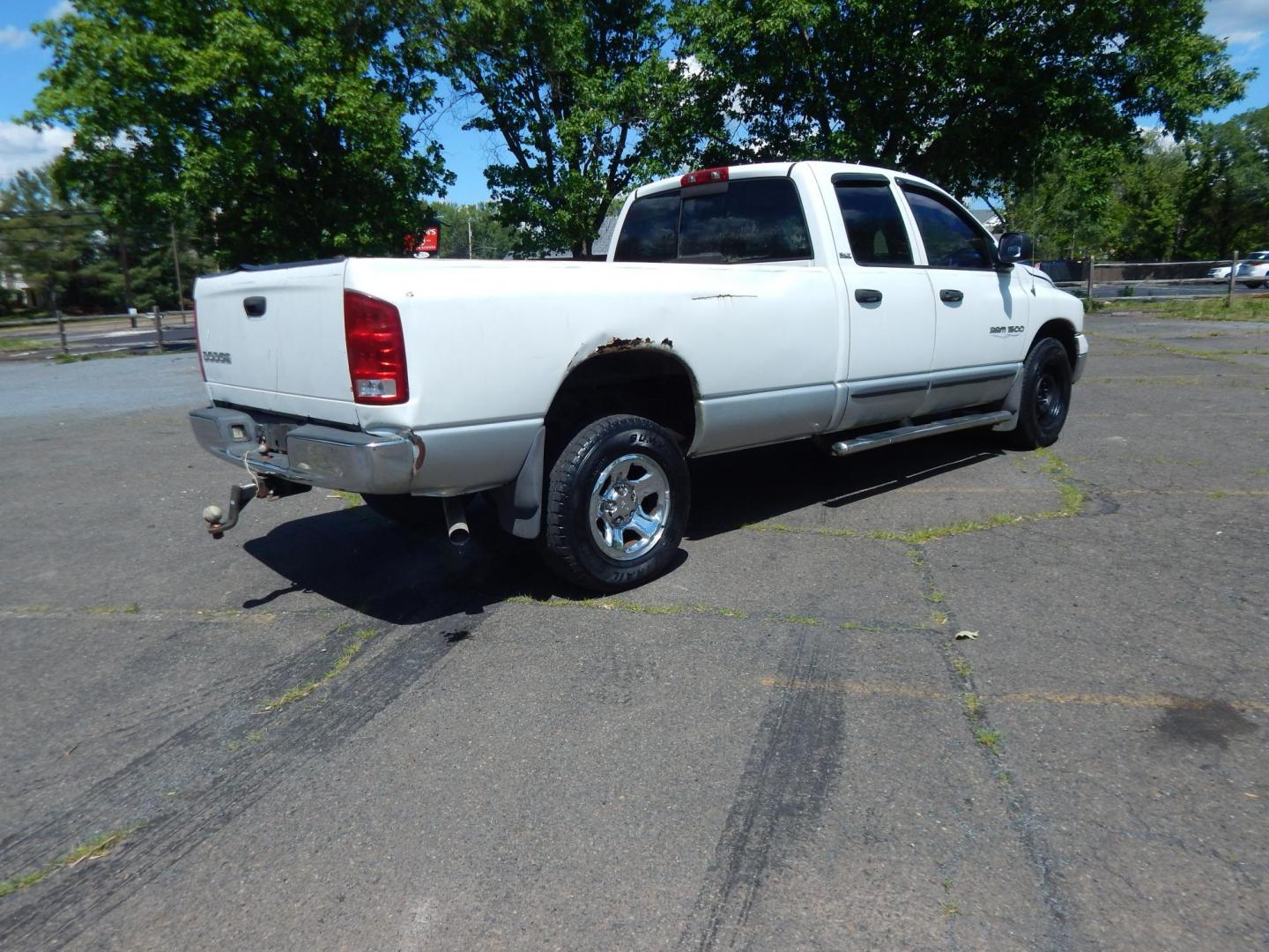 2002 White /Black Dodge Ram 1500 SLT Plus Quad Cab Long Bed 2WD (3D7HA18N52G) with an 4.7L V8 SOHC 16V engine, AUtomatic transmission, located at 6528 Lower York Road, New Hope, PA, 18938, (215) 862-9555, 40.358707, -74.977882 - Here we have a Ram 1500 with a 4.7L V8 putting power to the rear wheels via an automatic transmission. Options include: black cloth, heat, AM/FM/CD radio, cruise control, tilt steering wheel and a rear sliding window. This truck is being sold AS-IS and on consignment for a local client of ours. Kno- Photo#3