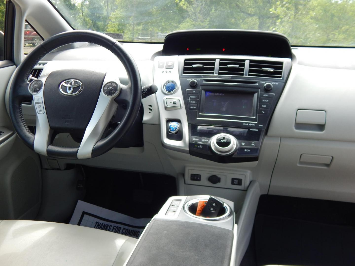 2013 White /Gray Toyota Prius V Three (JTDZN3EU2D3) with an 1.8L L4 DOHC 16V HYBRID engine, Continuously Variable Transmission transmission, located at 6528 Lower York Road, New Hope, PA, 18938, (215) 862-9555, 40.358707, -74.977882 - Here we have a 2013 Prius with a 1.8L inline 4 cylinder hybrid engine putting power to the front wheels via an automatic transmission. Options include: gray leather, manual seats, heated front seats, cold AC, heat, AM/FM/BLUETOOTH radio, back up camera, push button start, cruise control, tilt steeri - Photo#16