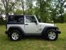 2011 Silver /Black Jeep Wrangler Sport 4WD (1J4AA2D12BL) with an 3.8L V6 OHV 12V engine, Automatic transmission, located at 6528 Lower York Road, New Hope, PA, 18938, (215) 862-9555, 40.358707, -74.977882 - Here we have a 2011 Jeep Wrangler Sport with a 3.8L V6 putting power to an automatic 4x4 transmission. Options include: black cloth, heat and AC, JVC aftermarket radio, cruise control, tilt steering wheel, 3 piece hard top, power windows/locks/mirrors, 17 inch alloy wheels with 4 Goodyear Wrangler t - Photo#5
