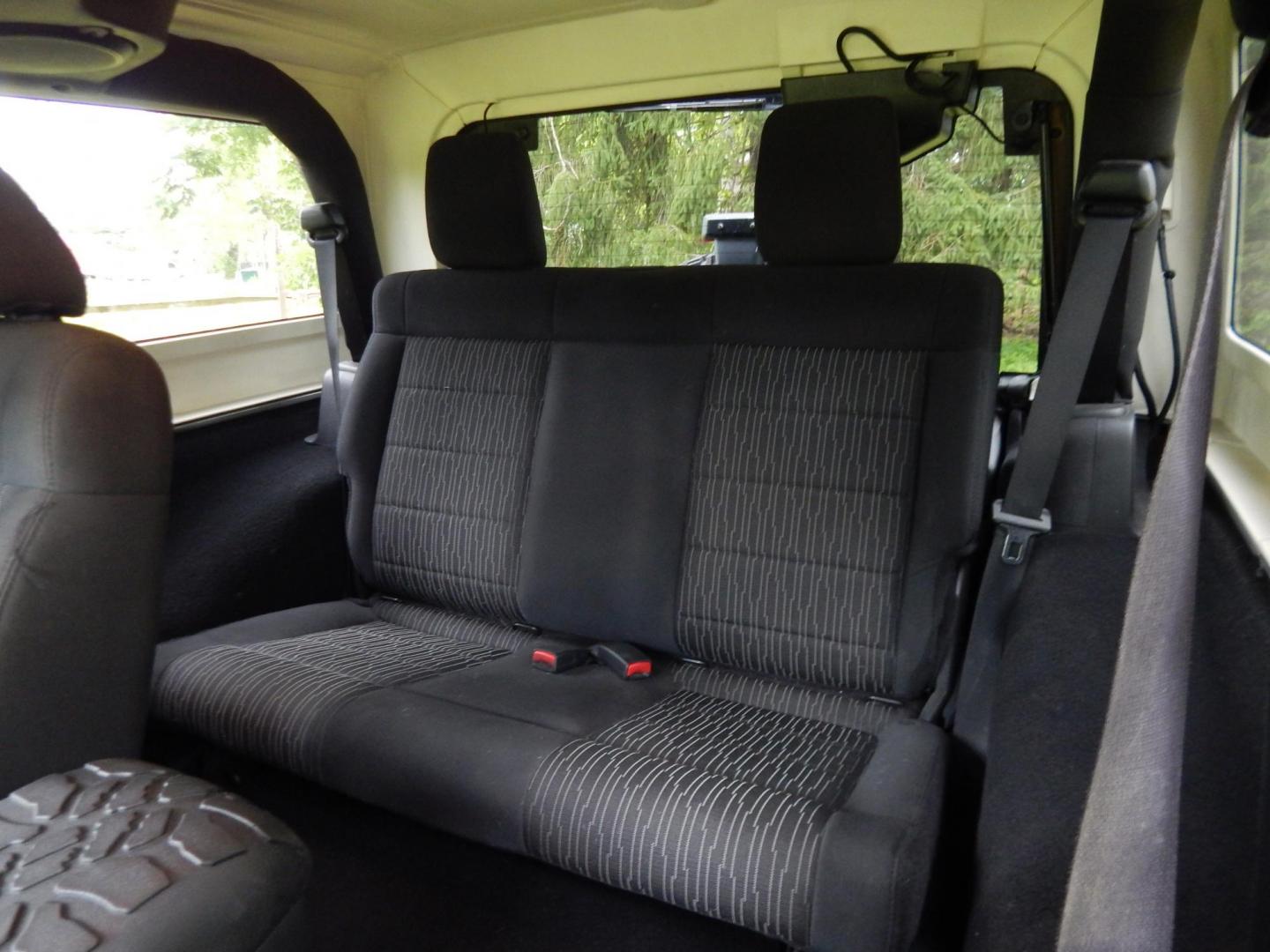 2011 Silver /Black Jeep Wrangler Sport 4WD (1J4AA2D12BL) with an 3.8L V6 OHV 12V engine, Automatic transmission, located at 6528 Lower York Road, New Hope, PA, 18938, (215) 862-9555, 40.358707, -74.977882 - Here we have a 2011 Jeep Wrangler Sport with a 3.8L V6 putting power to an automatic 4x4 transmission. Options include: black cloth, heat and AC, JVC aftermarket radio, cruise control, tilt steering wheel, 3 piece hard top, power windows/locks/mirrors, 17 inch alloy wheels with 4 Goodyear Wrangler t - Photo#10