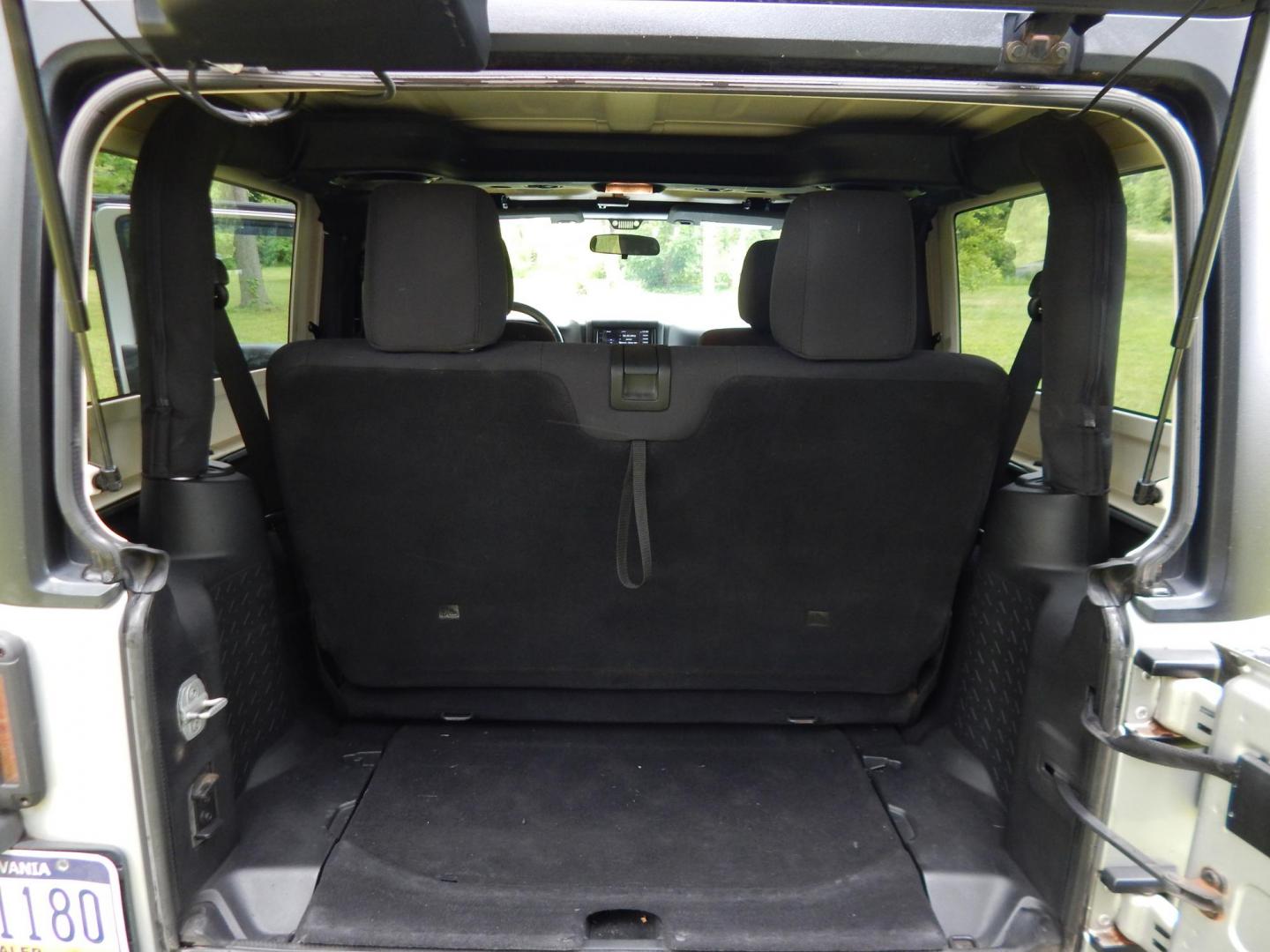 2011 Silver /Black Jeep Wrangler Sport 4WD (1J4AA2D12BL) with an 3.8L V6 OHV 12V engine, Automatic transmission, located at 6528 Lower York Road, New Hope, PA, 18938, (215) 862-9555, 40.358707, -74.977882 - Here we have a 2011 Jeep Wrangler Sport with a 3.8L V6 putting power to an automatic 4x4 transmission. Options include: black cloth, heat and AC, JVC aftermarket radio, cruise control, tilt steering wheel, 3 piece hard top, power windows/locks/mirrors, 17 inch alloy wheels with 4 Goodyear Wrangler t - Photo#12