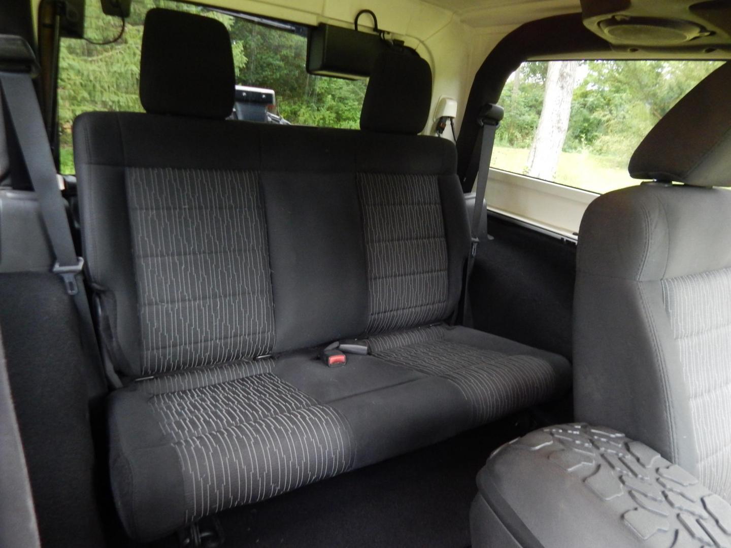2011 Silver /Black Jeep Wrangler Sport 4WD (1J4AA2D12BL) with an 3.8L V6 OHV 12V engine, Automatic transmission, located at 6528 Lower York Road, New Hope, PA, 18938, (215) 862-9555, 40.358707, -74.977882 - Here we have a 2011 Jeep Wrangler Sport with a 3.8L V6 putting power to an automatic 4x4 transmission. Options include: black cloth, heat and AC, JVC aftermarket radio, cruise control, tilt steering wheel, 3 piece hard top, power windows/locks/mirrors, 17 inch alloy wheels with 4 Goodyear Wrangler t - Photo#13