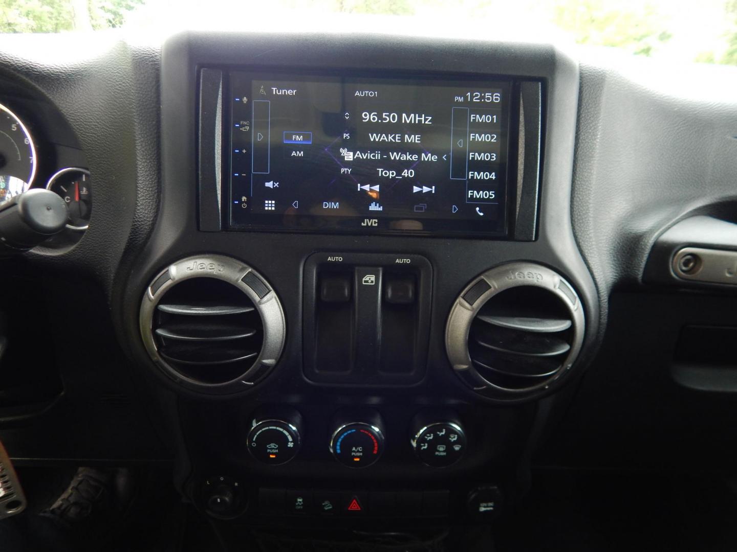 2011 Silver /Black Jeep Wrangler Sport 4WD (1J4AA2D12BL) with an 3.8L V6 OHV 12V engine, Automatic transmission, located at 6528 Lower York Road, New Hope, PA, 18938, (215) 862-9555, 40.358707, -74.977882 - Here we have a 2011 Jeep Wrangler Sport with a 3.8L V6 putting power to an automatic 4x4 transmission. Options include: black cloth, heat and AC, JVC aftermarket radio, cruise control, tilt steering wheel, 3 piece hard top, power windows/locks/mirrors, 17 inch alloy wheels with 4 Goodyear Wrangler t - Photo#16