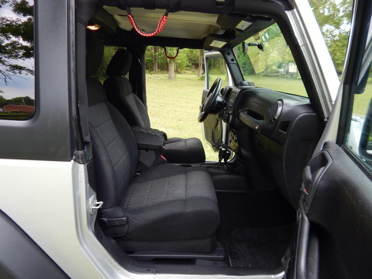 2011 Silver /Black Jeep Wrangler Sport 4WD (1J4AA2D12BL) with an 3.8L V6 OHV 12V engine, Automatic transmission, located at 6528 Lower York Road, New Hope, PA, 18938, (215) 862-9555, 40.358707, -74.977882 - Here we have a 2011 Jeep Wrangler Sport with a 3.8L V6 putting power to an automatic 4x4 transmission. Options include: black cloth, heat and AC, JVC aftermarket radio, cruise control, tilt steering wheel, 3 piece hard top, power windows/locks/mirrors, 17 inch alloy wheels with 4 Goodyear Wrangler t - Photo#15