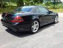 2009 Black /Black Mercedes-Benz SL-Class SL550 (WDBSK71F99F) with an 5.5L V8 DOHC 32V engine, 7-Speed Automatic transmission, located at 6528 Lower York Road, New Hope, PA, 18938, (215) 862-9555, 40.358707, -74.977882 - Here we have a Mercedes SL500 convertible with a 5.5L V8 putting power to the rear wheels via an automatic transmission. Options include: black leather with wood trim, heated and cooled seats, air scarf, power seats, dual climate controls, AM/FM/CD/SAT/AUX radio with navigation, power tilt steering - Photo#6