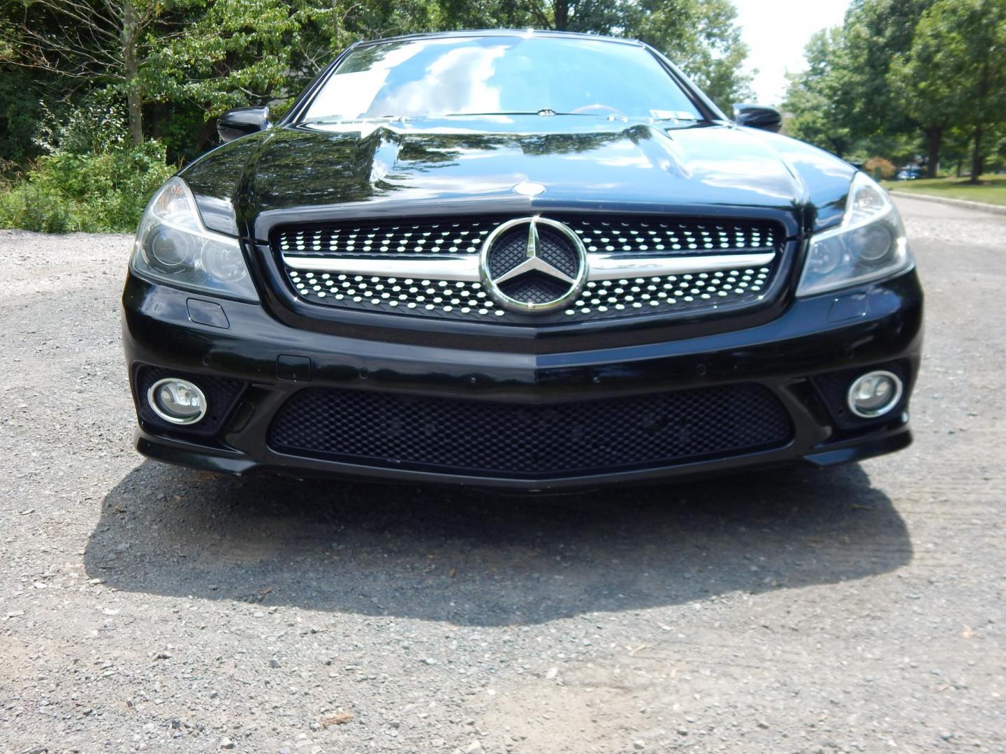 2009 Black /Black Mercedes-Benz SL-Class SL550 (WDBSK71F99F) with an 5.5L V8 DOHC 32V engine, 7-Speed Automatic transmission, located at 6528 Lower York Road, New Hope, PA, 18938, (215) 862-9555, 40.358707, -74.977882 - Here we have a Mercedes SL500 convertible with a 5.5L V8 putting power to the rear wheels via an automatic transmission. Options include: black leather with wood trim, heated and cooled seats, air scarf, power seats, dual climate controls, AM/FM/CD/SAT/AUX radio with navigation, power tilt steering - Photo#9