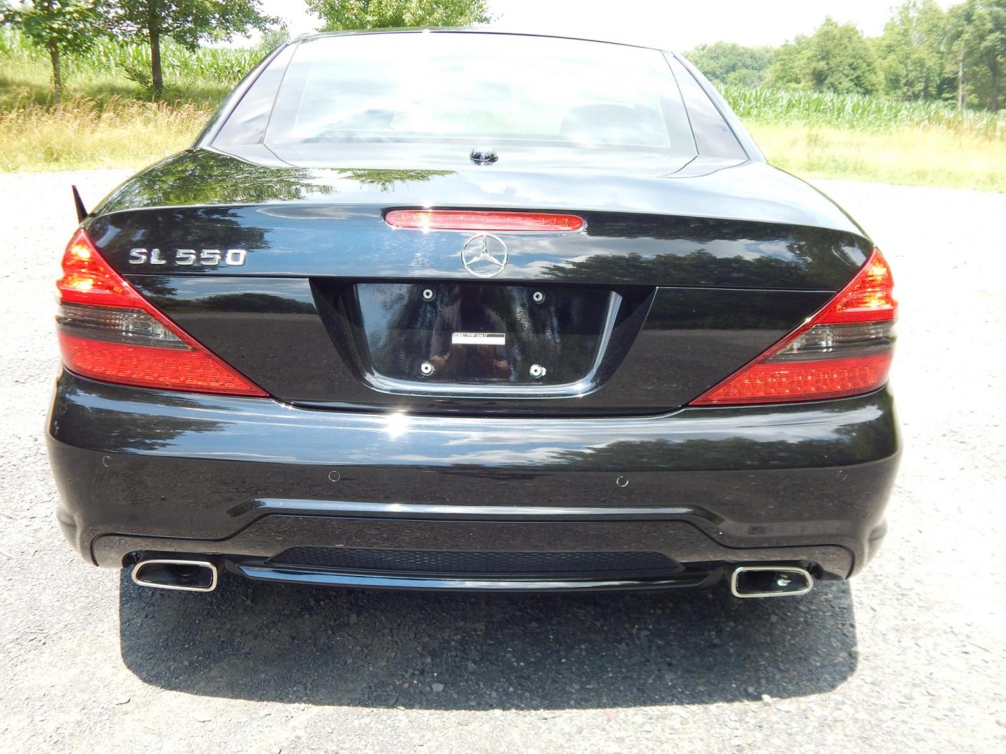 2009 Black /Black Mercedes-Benz SL-Class SL550 (WDBSK71F99F) with an 5.5L V8 DOHC 32V engine, 7-Speed Automatic transmission, located at 6528 Lower York Road, New Hope, PA, 18938, (215) 862-9555, 40.358707, -74.977882 - Here we have a Mercedes SL500 convertible with a 5.5L V8 putting power to the rear wheels via an automatic transmission. Options include: black leather with wood trim, heated and cooled seats, air scarf, power seats, dual climate controls, AM/FM/CD/SAT/AUX radio with navigation, power tilt steering - Photo#10