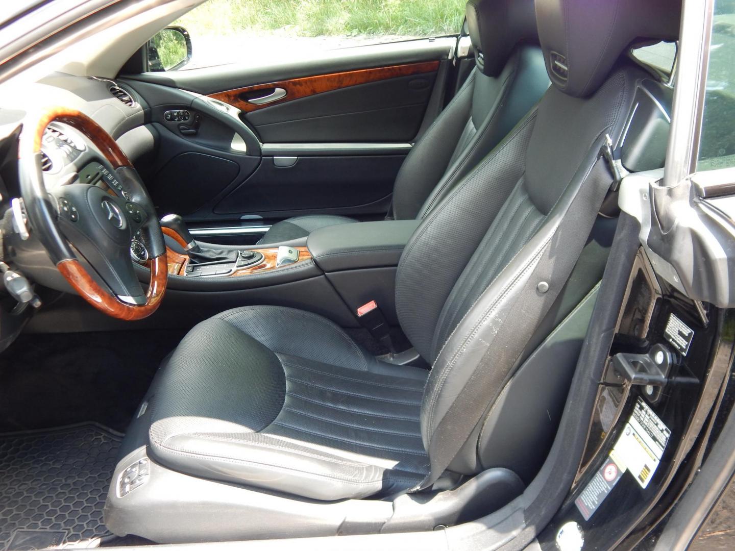 2009 Black /Black Mercedes-Benz SL-Class SL550 (WDBSK71F99F) with an 5.5L V8 DOHC 32V engine, 7-Speed Automatic transmission, located at 6528 Lower York Road, New Hope, PA, 18938, (215) 862-9555, 40.358707, -74.977882 - Here we have a Mercedes SL500 convertible with a 5.5L V8 putting power to the rear wheels via an automatic transmission. Options include: black leather with wood trim, heated and cooled seats, air scarf, power seats, dual climate controls, AM/FM/CD/SAT/AUX radio with navigation, power tilt steering - Photo#12